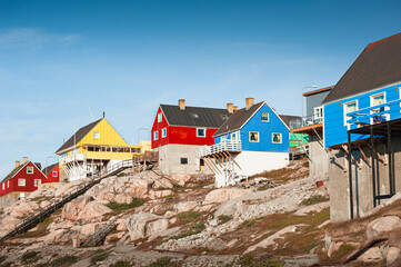 Colorful traditional houses on the rocks in Ilulissat, western Greenland.