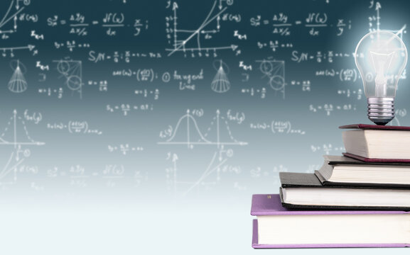 A stack of books in the shape of a staircase with a burning light bulb on top, against a gradient background of mathematical formulae and graphs. Concept to produce a new idea based on knowledge.