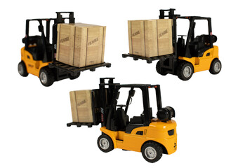 A forklift is lifting a box that says fragile