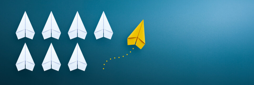 Business concept for new ideas creativity and innovative solution with Yellow paper plane. copy space