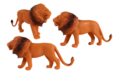 Plastic lion toy, isolated on white background.