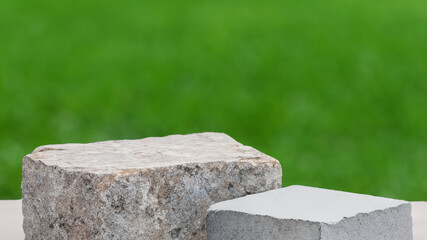 Podium with green forest blur background