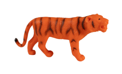 Plastic tiger toy, isolated on white background.