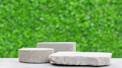 Podium with green forest blur background