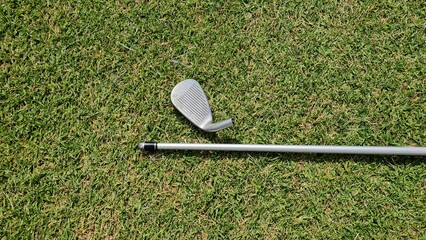 Broken golf club on the golf course