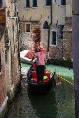 One of the most recognizable tourist attractions in the world - a gondola cruise through the narrow canals in Venice
