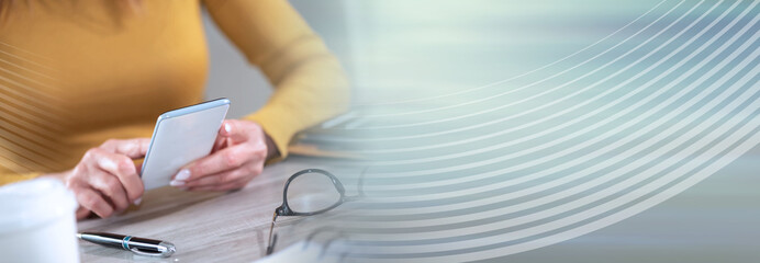 Woman using her mobile phone; panoramic banner