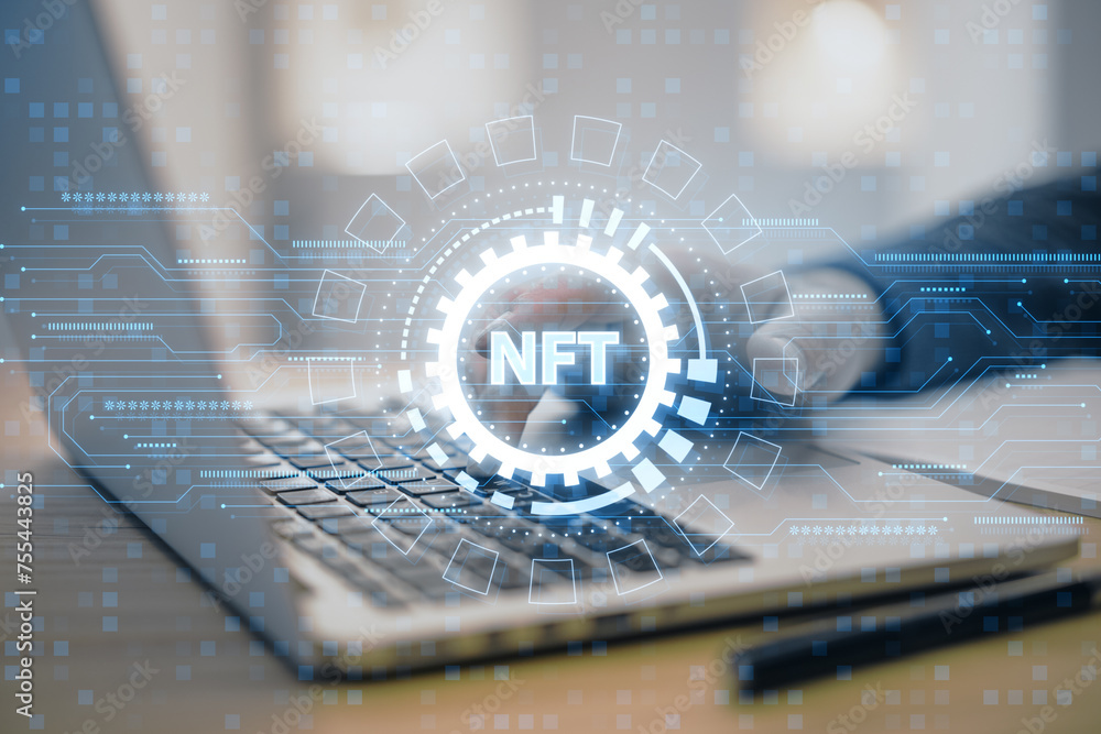Poster close up and side view of male hand using laptop with creative round nft hologram on blurry backgrou