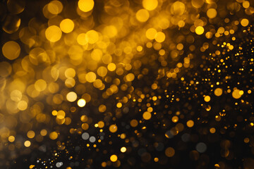 Fototapeta na wymiar bokeh of golden lights on a dark background