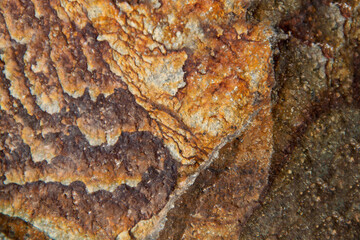 Texture of natural brown stone. Geodesy rocky texture