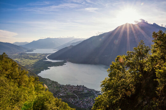 Italy, Province of Sondrio, Scenic view of sunset over Lake Mezzola in Riserva Naturale Pian di Spagna e Lago di Mezzola
