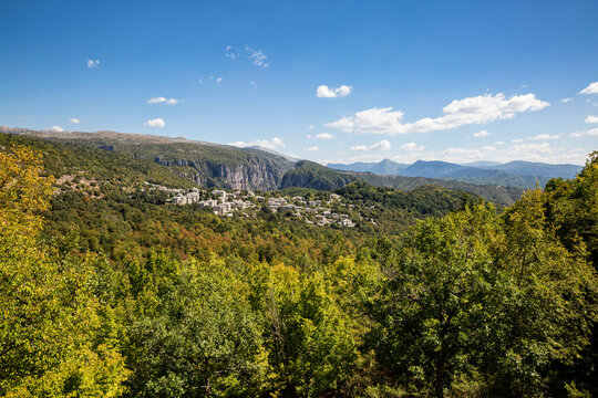 Greece, Epirus, Zagori, Forest surrounding village in Vikos-Aoos National Park during summer