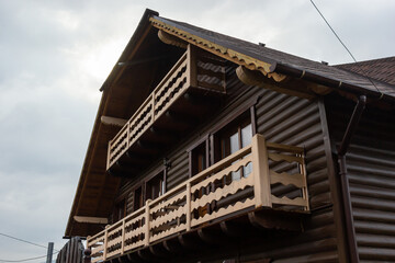 Beautiful modern terrace lounge, a large wooden terrace in a wooden house with a forest around. Nature and vacation concept