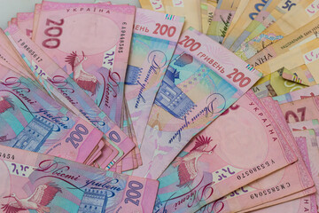 Fototapeta na wymiar Money of Ukraine. Background of ukrainian hryvnia banknotes. Hryvnia 500, 200. Uah. Money and save concept