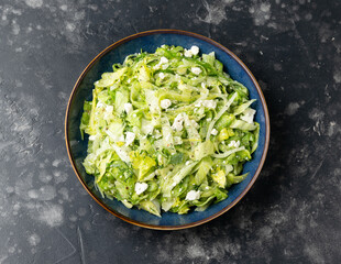 Maroulosalata Greek Lettuce Salad with with iceberg lettuce, herbs, feta cheese.