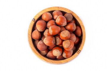 Shelled hazelnuts on the white background