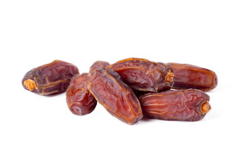 Dried date palm fruits on the white background