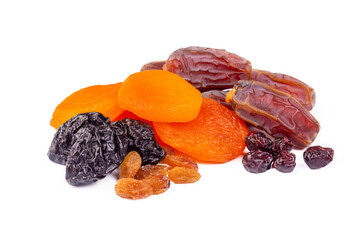 Dried fruits on a white background. Dried dates, grapes and apricots.