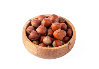 Shelled hazelnuts on the white background