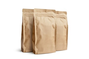 Three brown paper bags are stacked on top of each other. The bags are empty and appear to be of a similar size