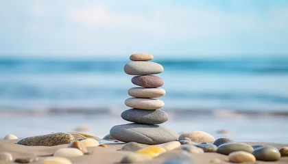 Tuinposter A stack of rocks on a beach © terra.incognita