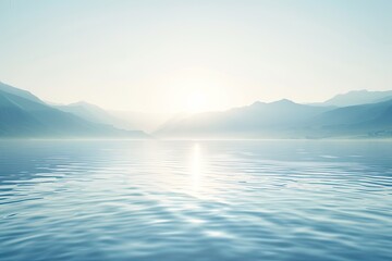sunrise over the sea. A blue lake and blue mountains in the sun. The radiance of the sun on the background of water and mountains.