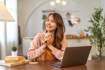 Young smiling asian woman happy relax use laptop conference work,learning, education, shopping, study online, webinar, online marketing, business, blog, digital internet advertising at home