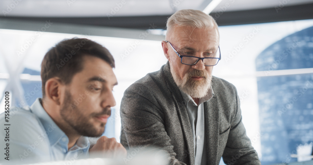 Aufkleber close up of succesful caucasian male lawyer talking to young law intern behind laptop computer in sk