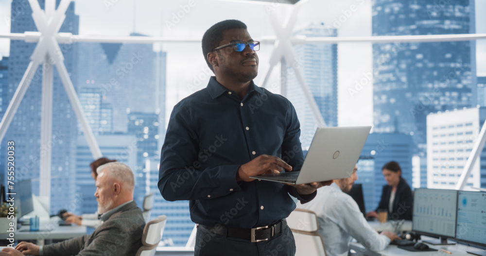 Poster african american financial analyst walking in skyscraper office with diverse employees in downtown. 