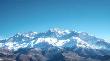 Obraz premium Snow-capped mountain ranges against a clear blue sky background