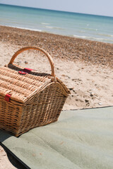 A picnic basket on the beach