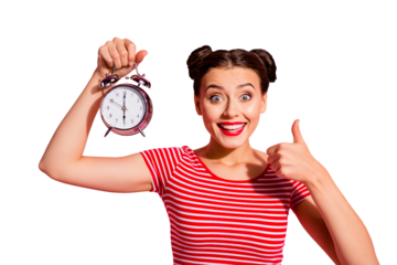 Close-up portrait of her she nice cute charming winsome attractive glamorous cheerful girl wearing striped t-shirt holding in hand showing clock thumbup hour isolated over pink pastel background