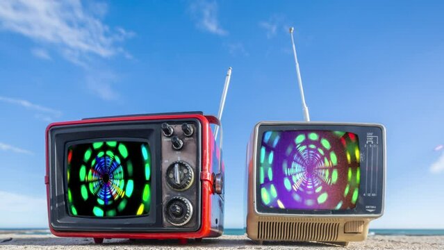 retro television and graphic equlaisers on the screen on a beach