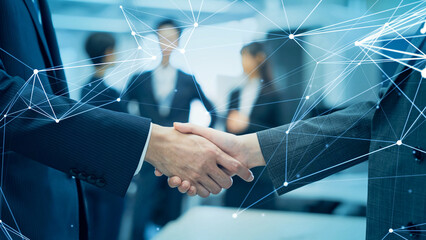 Group of people shaking hands in the office and communication network concept.