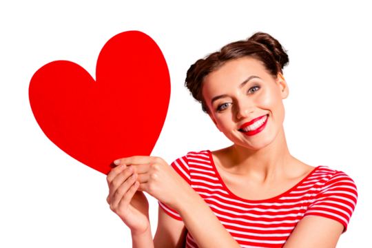 Close-up portrait of her she nice cute charming attractive lovely lovable cheerful cheery girl wearing striped t-shirt holding in hands showing big large heart isolated over pink pastel background