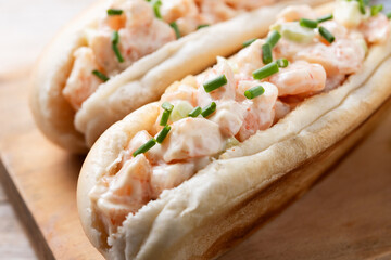 Lobster roll on wooden table. Close up