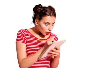 Close-up portrait of her she nice-looking cute attractive glamorous funny focused childish girl wearing striped t-shirt writing notes copybook isolated over pink pastel background