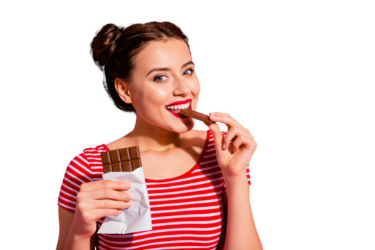 Close-up portrait of her she nice-looking cute charming attractive winsome lovely cheerful girl in striped t-shirt biting tasting eating desirable dessert isolated over pink pastel background