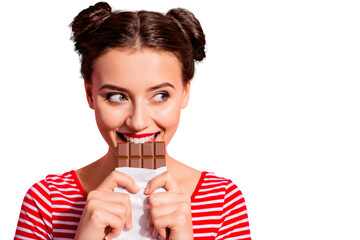 Close-up portrait of her she nice cute charming attractive glamorous cheerful sly cunning hungry girl in striped t-shirt biting tasting eating desirable favorite dessert isolated on pink background