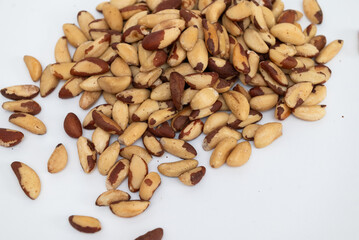 Close up brazil nuts on white background 