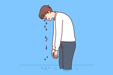 Upset business man cries standing in water, demonstrating depression or learned helplessness. Psychological concept of learned helplessness among company employees resulting from tactical management