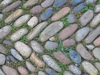 Old stone pavement road on the medieval street