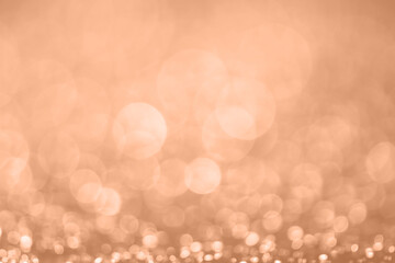 Abstract bokeh background, trendy color of the year 2024 Peach Fuzz.. - 755558053