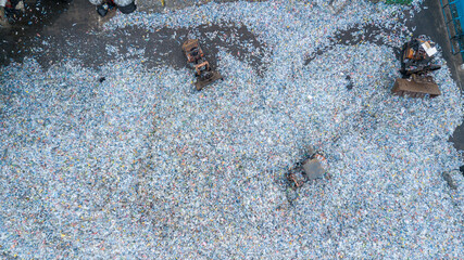 Aerial view plenty of plastic bottles, Waste plastic bottles other types of plastic waste at the waste disposal site, plastic bottles at the factory for processing and recycling PET recycling plant.