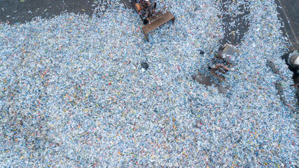 Aerial view plenty of plastic bottles, Waste plastic bottles other types of plastic waste at the waste disposal site, plastic bottles at the factory for processing and recycling PET recycling plant.