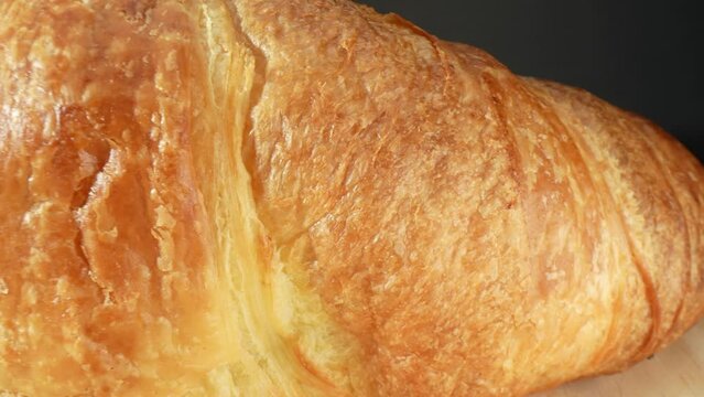 Croissants are made with butter, which is high in saturated fats. Consuming foods high in saturated fats has been linked to an increased risk of heart disease and other health issues. Food background.