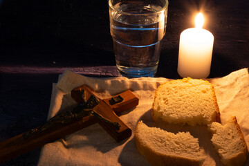Lent - water, bread and crucifix