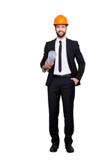 Full length size portrait of attractive cheerful joyful investor in orange hard hat and black tux,...