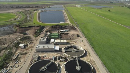 Drone photography of Ponds with sewage treatment plants In an agricultural area and Industrial compost production facility