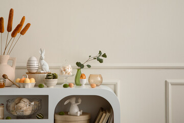 Minimalist composition of easter living room interior with copy space, easter bunny sculpture,...